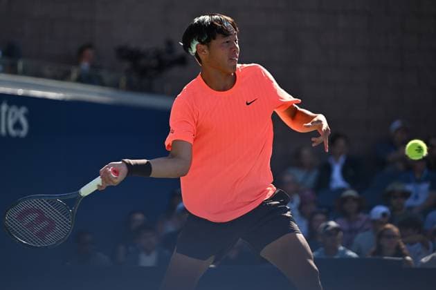 (250831) -- NEW YORK, Aug. 31, 2025 -- Coleman Wong of China s Hong Kong hits a return during the men s singles third round match against Andrey Rublev of Russia at the 2025 US Open tennis championships in New York, the United States, Aug. 30, 2025. ) (SP)U.S.-NEW YORK-TENNIS-US OPEN-MEN S SINGLES-RUBLEV VS WONG LixRui 