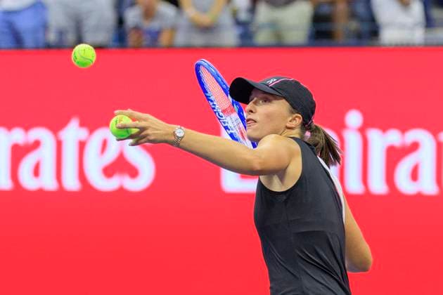 August 30, 2025, Flushing Meadows, New York, USA: Iga Swiatek hits autographed balls to the fans after winning her match against Anna Kalinskaya on Day 7 of the 2025 US Open at USTA Billie Jean King National Tennis Center on Saturday August 30, 2025 in the Flushing neighborhood of the Queens borough of New York City. JAVIER ROJAS PI Flushing Meadows USA - ZUMAp124 20250830_zaa_p124_148 Copyright: xJavierxRojasx