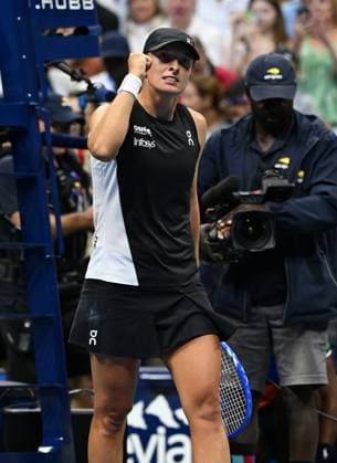 Iga Swiatek of Pol reacts after defeating Anna Kalinskya on Arthur Ashe Stadium on day 7 at the 2025 US Open Tennis Championship at the USTA Billie Jean King National Tennis Center in New York City on Thursday, August 30, 2025.  NYP20250830301 LARRYxMARANO