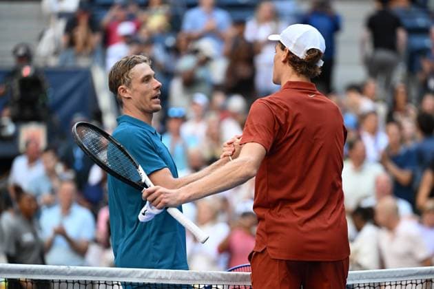 (250831) -- NEW YORK, Aug. 31, 2025 -- Denis Shapovalov (L) of Canada and Jannik Sinner of Italy shake hands after their men s singles third round match at the 2025 US Open tennis championships in New York, the United States, Aug. 30, 2025. ) (SP)U.S.-NEW YORK-TENNIS-US OPEN-MEN S SINGLES-SINNER VS SHAPOVALOV LixRui 