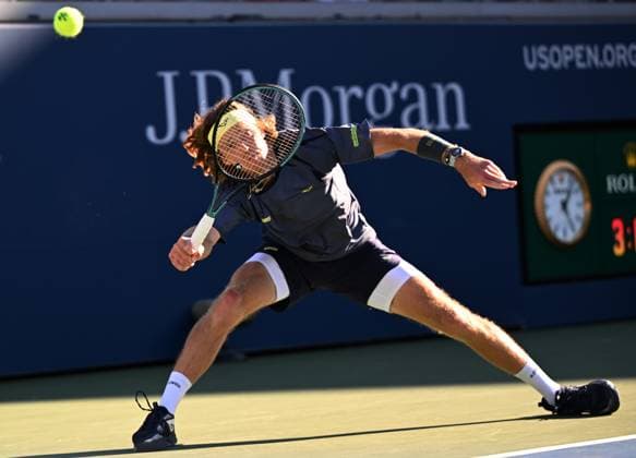 (250831) -- NEW YORK, Aug. 31, 2025 -- Andrey Rublev of Russia hits a return during the men s singles third round match against Coleman Wong of China s Hong Kong at the 2025 US Open tennis championships in New York, the United States, Aug. 30, 2025. ) (SP)U.S.-NEW YORK-TENNIS-US OPEN-MEN S SINGLES-RUBLEV VS WONG LixRui 