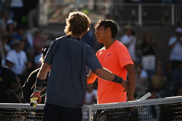 (250831) -- NEW YORK, Aug. 31, 2025 -- Coleman Wong (R) of China s Hong Kong and Andrey Rublev of Russia shake hands after their men s singles third round match at the 2025 US Open tennis championships in New York, the United States, Aug. 30, 2025. ) (SP)U.S.-NEW YORK-TENNIS-US OPEN-MEN S SINGLES-RUBLEV VS WONG LixRui 