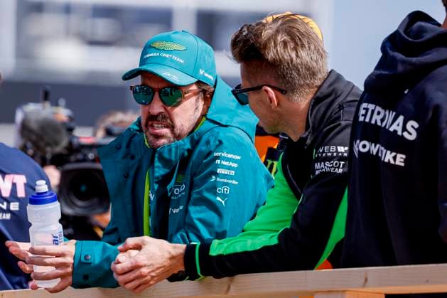 Drivers Parade Fernando Alonso of Spain and Aston Martin F1 Team looks on and Nico Hülkenberg of Germany and Stake F1 Team Kick Sauber during the Formula 1 Heineken Dutch Grand Prix 2025 on Day 3 at Circuit Zandvoort on August 31, 2025 in Zandvoort, Netherlands Photo by Marcel ter Bals DeFodi Images