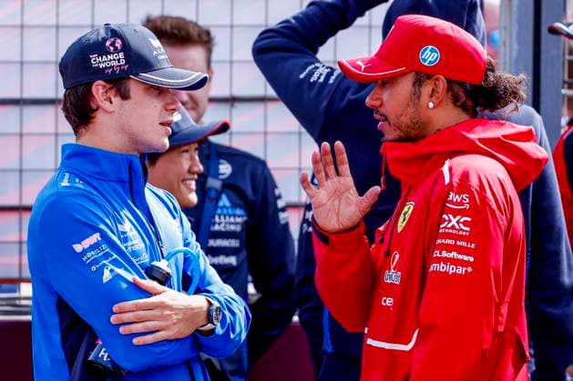 Drivers Parade Franco Colapinto of Argentina and BWT Alpine F1 Team and Lewis Hamilton of the United Kingdom and Scuderia Ferrari HP F1 Team looks on during the Formula 1 Heineken Dutch Grand Prix 2025 on Day 3 at Circuit Zandvoort on August 31, 2025 in Zandvoort, Netherlands Photo by Marcel ter Bals DeFodi Images
