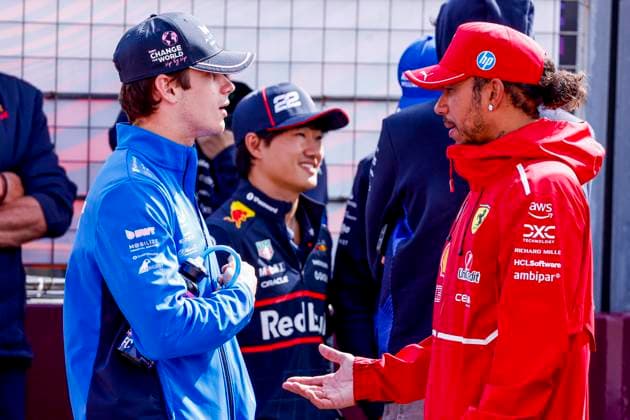 Drivers Parade Franco Colapinto of Argentina and BWT Alpine F1 Team and Lewis Hamilton of the United Kingdom and Scuderia Ferrari HP F1 Team looks on during the Formula 1 Heineken Dutch Grand Prix 2025 on Day 3 at Circuit Zandvoort on August 31, 2025 in Zandvoort, Netherlands Photo by Marcel ter Bals DeFodi Images