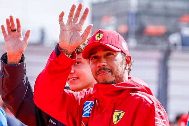 Drivers Parade Andrea Kimi Antonelli of Italy and Mercedes AMG Petronas F1 Team wave and Lewis Hamilton of the United Kingdom and Scuderia Ferrari HP F1 Team looks on during the Formula 1 Heineken Dutch Grand Prix 2025 on Day 3 at Circuit Zandvoort on August 31, 2025 in Zandvoort, Netherlands Photo by Marcel ter Bals DeFodi Images