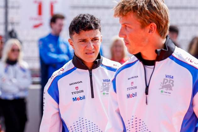 Drivers Parade Isack Hadjar of France and Visa Cash App Racing Bulls looks on and Liam Lawson of New Zealand and Visa Cash App Racing Bulls during the Formula 1 Heineken Dutch Grand Prix 2025 on Day 3 at Circuit Zandvoort on August 31, 2025 in Zandvoort, Netherlands Photo by Marcel ter Bals DeFodi Images
