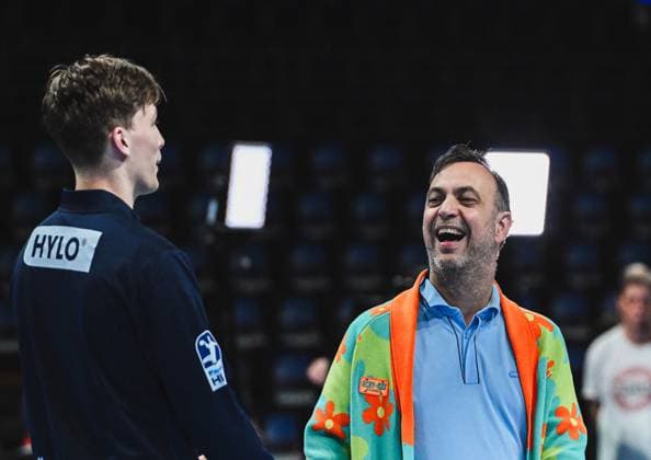 31 08 2025, xlakx, Handball Daikin HBL, Fuechse Berlin Bergischer HC v l Nils Lichtlein Fuechse Berlin , Bob Hanning Fuechse Berlin Managing Director laughing in conversation Berlin Daniel Lakomski