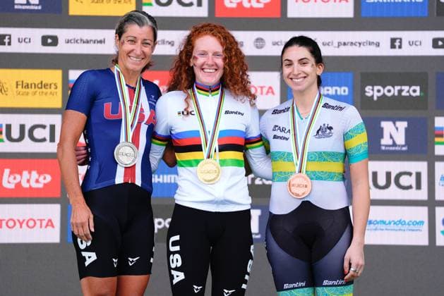 2025 UCI Para-cycling Road World Championships Picture by Olly Hassell SWpix.com - 31 08 2025 - Cycling - 2025 UCI Para-cycling Road World Championships - Ronse, Flanders, Belgium - Women C3 Road Race Podium - Clara Brown (USA) receiving the Gold Medal to become World Champion, Jamie Whitmore (USA) receiving the Silver Medal and Paige Greco (Australia) receiving the Bronze Medal Copyright: x xSWpix.comx(t axPhotographyxHubxLtd)xOllyxHassell SWpix.comx SWP-3069-1784