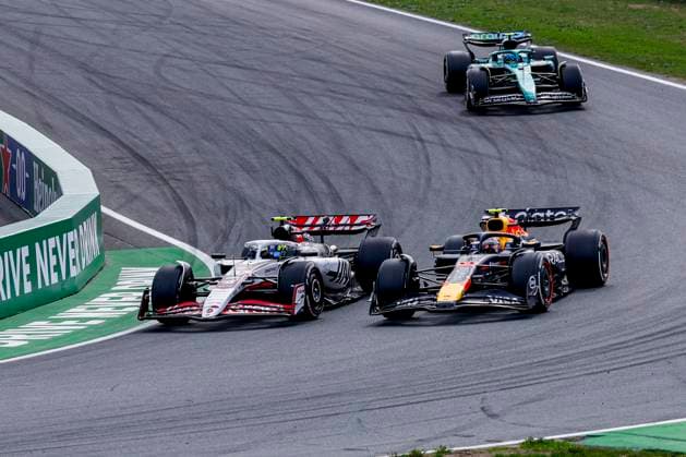 Oliver Bearman of the United Kingdom and Haas F1 Team and Yuki Tsunoda of Japan and Oracle Red Bull Racing batlle during the Formula 1 Heineken Dutch Grand Prix 2025 on Day 3 at Circuit Zandvoort on August 31, 2025 in Zandvoort, Netherlands Photo by Marcel ter Bals DeFodi Images