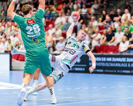 v l Tom Bergner GWD Minden, 28 , Ymir Oern Gislason Frisch Auf Goeppingen, 33 GER, GWD Minden vs Frisch Auf Goeppingen, Handball, 1 Bundesliga, 1 Matchday, Season 2025 2026, 31 08 2025 GER, GWD Minden vs Frisch Auf Goeppingen, Handball, 1 Bundesliga, 1 Matchday, Season 2025 2026, 31 08 2025 Luebbecke Copyright: xEibner-Pressefoto JanxRollingerx EP_JSK