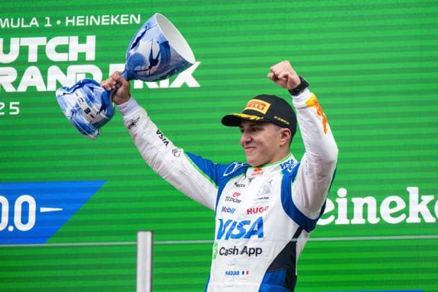 Isack Hadjar Visa Cash App Racing Bulls F1 Team, France, 06 cheers on the podium at the podium ceremony for 3rd place and his first podium finish, NED, Formula 1 World Championship, Heineken Grand Prix of the Netherlands, Circuit Zandvoort, Race, 2025 season, 31 08 2025 NED, Formula 1 World Championship, Heineken Grand Prix of the Netherlands, Circuit Zandvoort, Race, 2025 season, 31 08 2025 Zandvoort Copyright: xEibner-Pressefoto Memmlerx EP_MMR