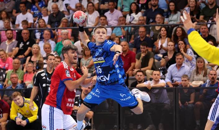 31 08 2025, Germany, Stuttgart, Handball Bundesliga season 2025 2026, TVB Stuttgart vs Hamburger SV, f l Jacob Arenth Lassen HSV , Simone Mengon TVB , Mohamed El Tayar HSV
