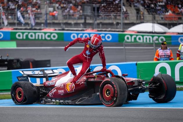 Charles Leclerc Scuderia Ferrari HP, Monaco, 16 climbs out of the damaged SF 25, NED, Formula 1 World Championship, Heineken Grand Prix of the Netherlands, Circuit Zandvoort, Race, 2025 season, 31 08 2025 NED, Formula 1 World Championship, Heineken Grand Prix of the Netherlands, Circuit Zandvoort, Race, 2025 season, 31 08 2025 Zandvoort, Race, 2025 season, 31 08 2025 Copyright: xEibner-Pressefoto Memmlerx EP_MMR