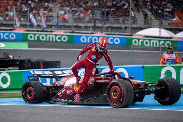Charles Leclerc Scuderia Ferrari HP, Monaco, 16 climbs out of the damaged SF 25, NED, Formula 1 World Championship, Heineken Grand Prix of the Netherlands, Circuit Zandvoort, Race, 2025 season, 31 08 2025 NED, Formula 1 World Championship, Heineken Grand Prix of the Netherlands, Circuit Zandvoort, Race, 2025 season, 31 08 2025 Zandvoort, Race, 2025 season, 31 08 2025 Copyright: xEibner-Pressefoto Memmlerx EP_MMR
