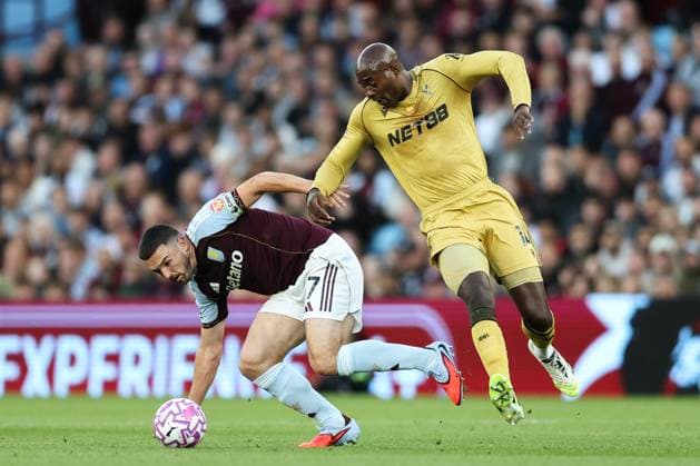 Birmingham, England, 31st August 2025. John McGinn of Aston Villa and Jean-Philippe Mateta of Crystal Palace battle for the ball during the Aston Villa vs Crystal Palace Premier League match at Villa Park, Birmingham. Picture credit should read: Jessica Hornby Sportimage EDITORIAL USE ONLY. No use with unauthorised audio, video, data, fixture lists, club league logos or live services. Online in-match use limited to 120 images, no video emulation. No use in betting, games or single club league player publications. SPI_039_JH_Villa_Palace SPI-4102-0039