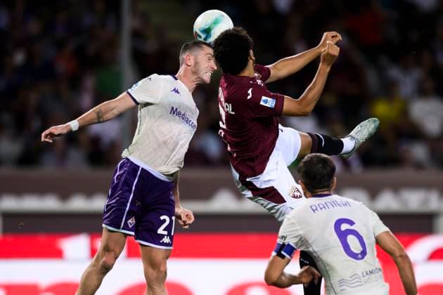 Torino FC v ACF Fiorentina - Serie A Robin Gosens of ACF Fiorentina competes for a header with Zakaria Aboukhlal of Torino FC during the Serie A football match between Torino FC and ACF Fiorentina. Turin Italy Copyright: xNicolòxCampox
