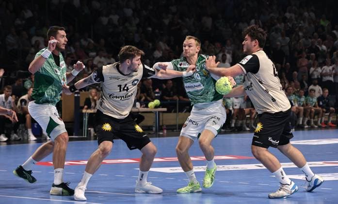 Mijajlo Marsenic, Gerdas Babarskas, Mathias Gidsel on the ball, Aron Seesing duel Game scene Action Sport Handball HBL Bundesliga Men 1 Matchday Season 2025 2026 31 08 2025 Füchse Berlin vs Bergischer HC