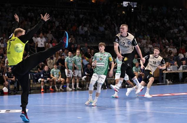 Noah Beyer scores a goal against goalkeeper Lasse Ludwig duel Game scene Action Sport Handball HBL Bundesliga Men 1 Matchday Season 2025 2026 31 08 2025 Füchse Berlin vs Bergischer HC