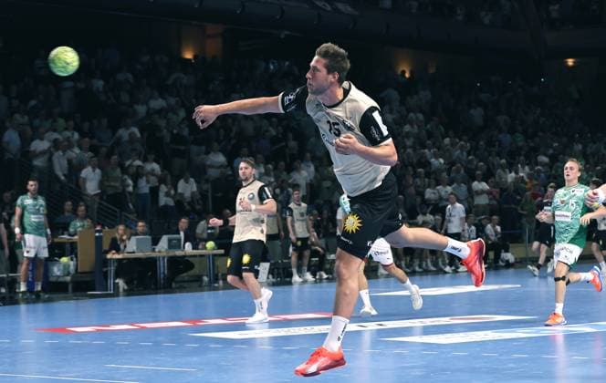 Lars Mitchell Kooij on the ball Single image Crop Action Sport Handball HBL Bundesliga Men 1 Matchday Season 2025 2026 31 08 2025 Füchse Berlin vs Bergischer HC