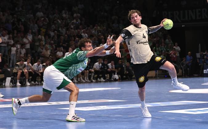 Lukas Herburger, Elias Scholtes on the ball duel Match scene Action Sport Handball HBL Bundesliga Men 1 Matchday Season 2025 2026 31 08 2025 Füchse Berlin vs Bergischer HC