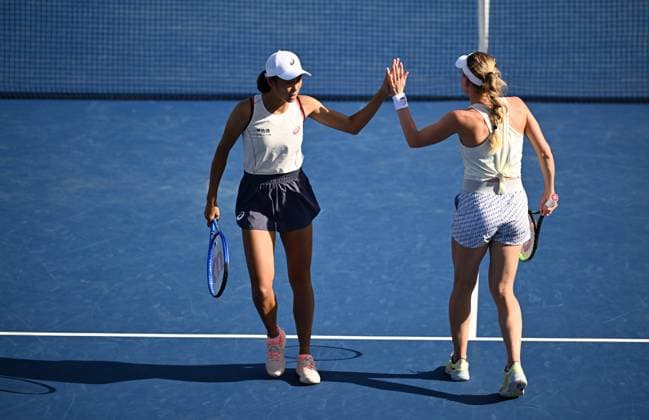 (250901) -- NEW YORK, Sept. 1, 2025 -- Zhang Shuai (L) of China Ekaterina Alexandrova of Russia celebrate scoring during the women s doubles second round match against Katie Boulter Sonay Kartal of Britain at the 2025 US Open tennis championships in New York, the United States, Aug. 31, 2025. ) (SP)U.S.-NEW YORK-TENNIS-US OPEN-WOMEN S DOUBLES-SECOND ROUND LixRui 