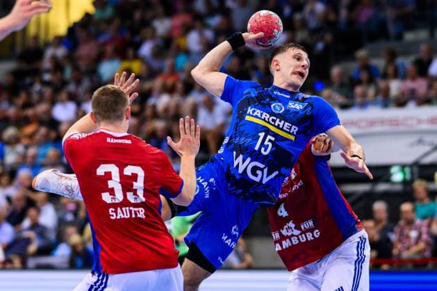 TVB Stuttgart HSV Hamburg Handball 1 Bundesliga, Men, Season 2025 2026, TVB Stuttgart HSV Hamburg, Porsche Arena Stuttgarts Simone Mengon M in action against Hamburgs Moritz Sauter l and Hamburgs Andreas Magaard r Stuttgart Porsche Arena Baden Württemberg Germany