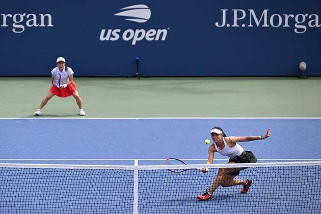 (250902) -- NEW YORK, Sept. 2, 2025 -- Wang Yafan (R) Aoyama Shuko compete during the women s doubles third round match between Wang Yafan of China Aoyama Shuko of Japan and Mirra Andreeva Diana Shnaider of Russia at the 2025 US Open tennis championships in New York, the United States, Sept. 1, 2025. ) (SP)U.S.-NEW YORK-TENNIS-US OPEN-WOMEN S DOUBLES-THIRD ROUND LixRui 