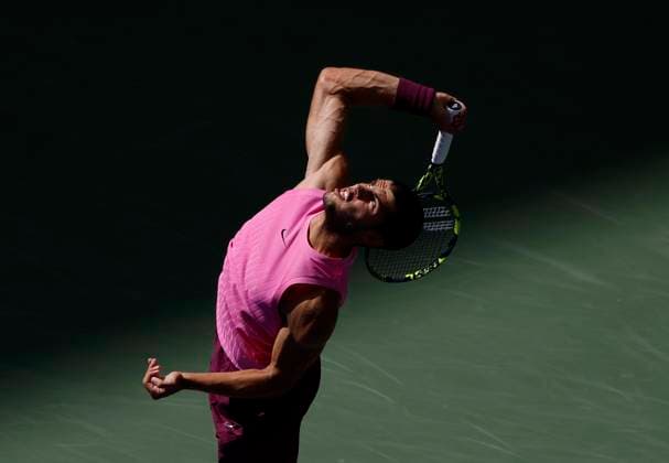 Carlos Alcaraz of Spain serves to Jiri Lehecka Czechia in the first set before defeating Lehecka in straight sets in their quarterfinal match in Arthur Ashe Stadium on day 10 at the 2025 US Open Tennis Championship at the USTA Billie Jean King National Tennis Center in New York City on Tuesday, September 2, 2025.  NYP20250902126 JOHNxANGELILLO