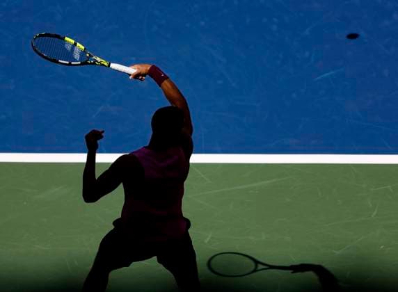 Carlos Alcaraz of Spain returns a ball to Jiri Lehecka of Czechia in the first set before defeating Lehecka in straight sets in their quarterfinal match in Arthur Ashe Stadium on day 10 at the 2025 US Open Tennis Championship at the USTA Billie Jean King National Tennis Center in New York City on Tuesday, September 2, 2025.  NYP20250902127 JOHNxANGELILLO