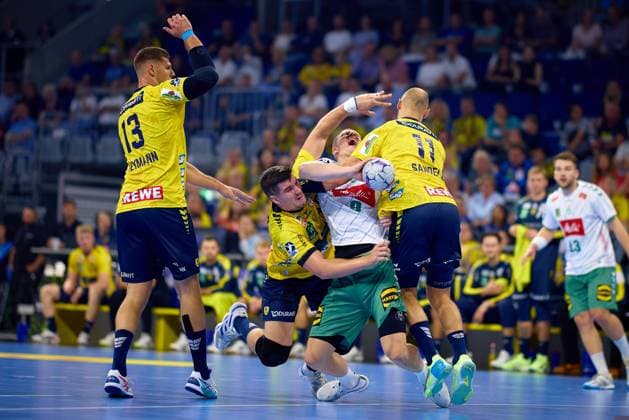 Sebastian Heymann 13 Rhein Neckar Löwen , Lukas Sandell 11 Rhein Neckar Löwen , Halil Jaganjac 45, Rhein Neckar Löwen and Karolis Antanavicius 8 TSV GWD Minden fight for the ball in the hall Handball I Men I Season 2025 2026 I Daikin HBL I 1 Matchday I Rhein Neckar Löwen - GWD Minden I 03 09 2025 Copyright: xMaxxMesterx