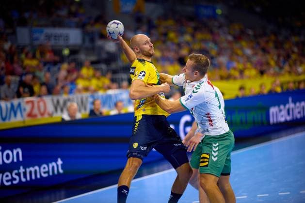 Player Lukas Sandell 11 Rhein Neckar Löwen is harassed by an opponent in the hall Handball I Men I Season 2025 2026 I Daikin HBL I 1 Matchday I Rhein Neckar Löwen - GWD Minden I 03 09 2025 Copyright: xMaxxMesterx