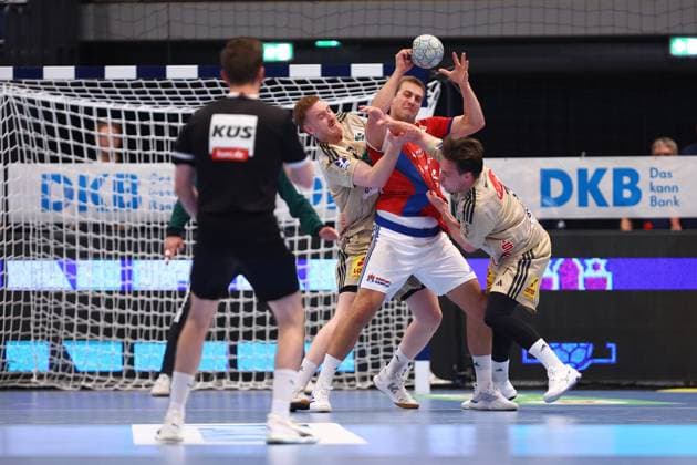 13 Niklas Weller Handball Sport Verein Hamburg , 7 Leif Tissier and 39 Lukas Stutzke Hannover Burgdorf Handball I Men I Bundesliga Daikin HBL I Season 2025 2026 I 2 Matchday I HSV Hamburg TSV Hannover Burgdorf I 03 09 2025 I Sporthalle Hamburg