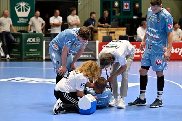 GER, 1 HBL, BHC06, BHC06 HC Erlangen 03 09 2025,Wuppertal ,Unihalle, GER, 1 Liqui Moly HBL, BHC06 HC Erlangen 1 Liqui Moly HBL regulations prohibit any use of photographs as image sequences and or quasi video in the picture Sander Andreassen Overjordet HC Erlangen 6 is treated NordphotoxGmbHx xFreund nph00018