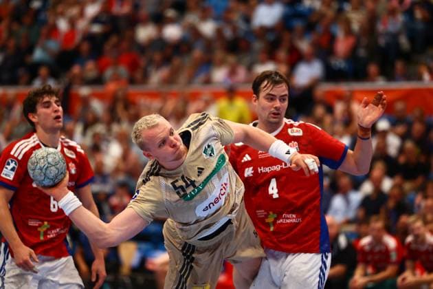 Handball I Men I Season 2025 2026 I Bundesliga I 2 Matchday I HSV Hamburg TSV Hannover Burgdorf I 03 09 2025 Justus Fischer 54, TSV Hannover Burgdorf Andreas Magaard 4, HSV Hamburg Hamburg Alsterdorfer Sporthalle Hamburg Germany Copyright: xLobeca RalfxHomburgx