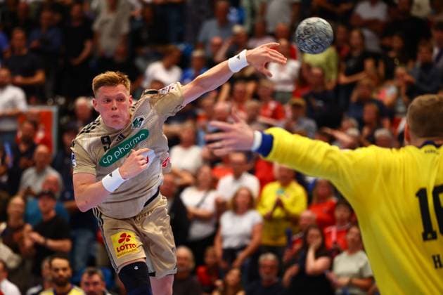 Handball I Men I Season 2025 2026 I Bundesliga I 2 Matchday I HSV Hamburg TSV Hannover Burgdorf I 03 09 2025 Vihelm Poulsen 9, TSV Hannover Burgdorf Robin Haug 16, HSV Hamburg Hamburg Alsterdorfer Sporthalle Hamburg Germany Copyright: xLobeca RalfxHomburgx