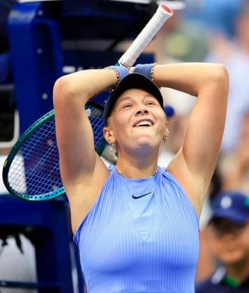 Amanda Anisimova celebrates after match point defeating Iga Swiatek of Poland in straight sets in the quarterfinals in Arthur Ashe Stadium on day 11 at the 2025 US Open Tennis Championship at the USTA Billie Jean King National Tennis Center in New York City on Wednesday, September 3, 2025. Anisimova defeated Swiatek 6-4, 6-3 and advanced to the semifinals.  NYP20250903104 JOHNxANGELILLO