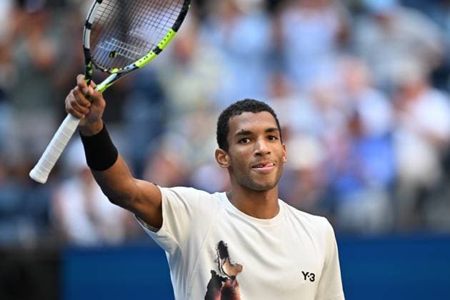 (250904) -- NEW YORK, Sept. 4, 2025 -- Felix Auger-Aliassime of Canada celebrates after winning the men s singles quarterfinal match against Alex de Minaur of Australia at the 2025 US Open tennis championships in New York, the United States, Sept. 3, 2025. ) (SP)U.S.-NEW YORK-TENNIS-US OPEN-MEN S SINGLES-AUGER-ALIASSIME VS DE MINAUR LixRui 