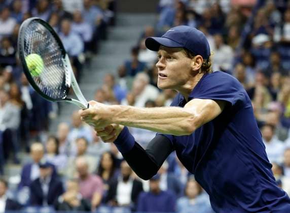 Jannik Sinner of Italy returns a ball to Lorenzo Musetti of Italy in the 2nd set of their quarterfinal match in Arthur Ashe Stadium on day 11 at the 2025 US Open Tennis Championship at the USTA Billie Jean King National Tennis Center in New York City on Wednesday, September 3, 2025.  NYP20250903147 JOHNxANGELILLO