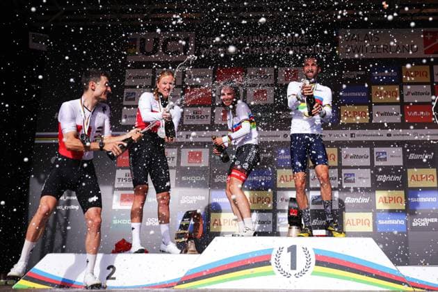 2025 UCI Mountain Bike World Championships Picture by Ed Sykes SWpix.com - 04 09 2025 - Cycling - 2025 UCI Mountain Bike World Championships - E-MTB Cross-Country - Aletsch Arena Bellwald, Valais, Switzerland - Elite E-MTB Cross-country Podium - Jerome Gilloux (France) and Anna Spielmann (Austria) receiving the Gold Medals to become World Champions, Joris Ryf (Switzerland) and Kathrin Stirnemann (Switzerland) receiving the Silver Medals and Hugo Pigeon (France) and Sofia Lena Wiedenroth (Germany) receiving the Bronze Medals Copyright: x xSWpix.comx(t axPhotographyxHubxLtd)xEdxSykes SWpix.comx SWP-3030-1634