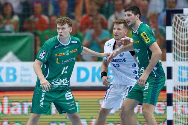 04 09 2025, xtgx, Handball, Daikin HBL, SC DHfK Leipzig TBV Lemgo Lippe v l Tim Hertzfeld Leipzig, 72 , Adam Nyfjaell Lemgo, 22 , Marko Mamic Leipzig, 14 duel, duel, fight, tackle Leipzig