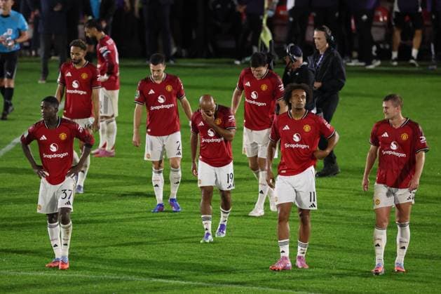 Bryan Mbeumo of Manchester United, ManU and team mates look dejected at full time Grimsby Town v Manchester United, EFL Carabao Cup, Second Round, Football, Blundell Park, Grimsby, UK - 27 Aug 2025Grimsby Blundell Park United Kingdom EDITORIAL USE ONLY No use with unauthorised audio, video, data, fixture lists, club league logos or live services. Online in-match use limited to 120 images, no video emulation. No use in betting, games or single club league player publications. Copyright: xPaulxCurrie Shutterstockx 15457582ei