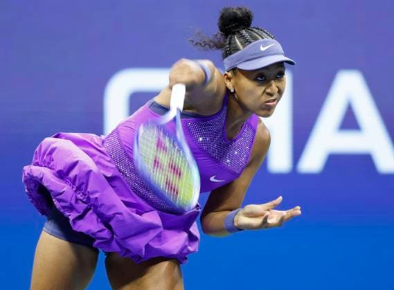 Naomi Osaka of Japan serves to Amanda Anisimova in the 1st set in a Women s semifinal match at the 2025 US Open Tennis Championship at the USTA Billie Jean King National Tennis Center in New York City on Thursday, September 4, 2025.  NYP20250904909 JOHNxANGELILLO