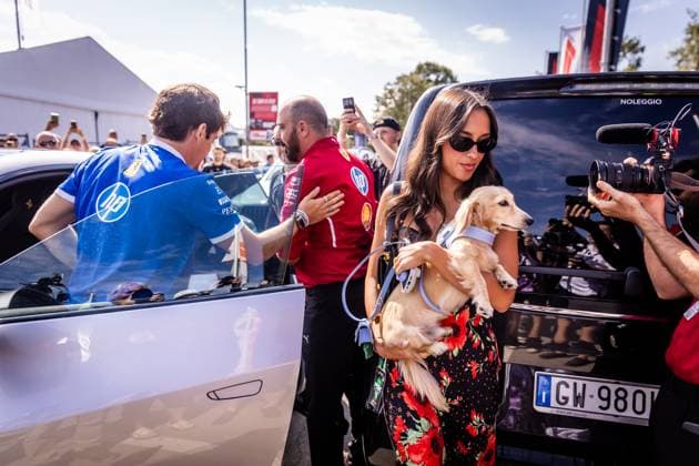 F1 ITALIAN GRAND PRIX FRIDAY Charles Leclerc of Monaco and Scuderia Ferrari cheers the fans with his girlfriend Alexandra Saint Mleux and his dog Leo ahead of friday s practice of the F1 Grand Prix of Italy - Formula 1 Pirelli Gran Premio D Italia 2025 at Autodromo Nazionale Monza Circuit on September 05, 2025, in Monza, Italy. Copyright: xx 080A3386