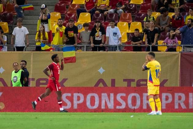 September 05.2025, Test match, National Arena, Bucharest, Romania vs Canada 20 Jonathan David celebrates his team s first goal and 10 Nicolae Stanciu has his face coverd by hands