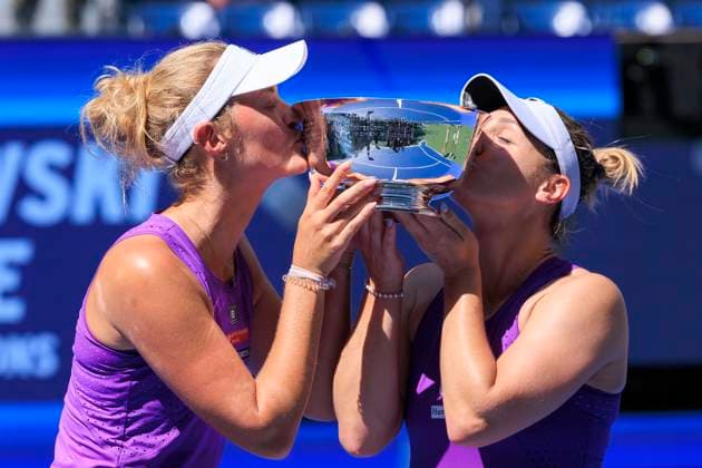 September 5, 2025, Flushing Meadows, New York, USA: Gabriela Dabrowski (R) and Erin Routliffe kiss the trophy after winning the WomenÃ¢â‚¬â ¢s Doubles Final match against Katerina Siniakova and Taylor Townsend on Day 13 of the 2025 US Open at USTA Billie Jean King National Tennis Center on Friday September 5, 2025 in the Flushing neighborhood of the Queens borough of New York City. JAVIER ROJAS PI Flushing Meadows USA - ZUMAp124 20250905_zaa_p124_036 Copyright: xJavierxRojasx