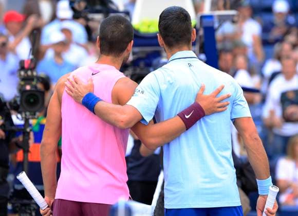 Novak Djokovic of Serbia (R) and Carlos Alcaraz of Spain pose for a photo before their Men s semifinal match at the 2025 US Open Tennis Championship at the USTA Billie Jean King National Tennis Center in New York City on Friday, September 5, 2025.  NYP20250905903 JOHNxANGELILLO