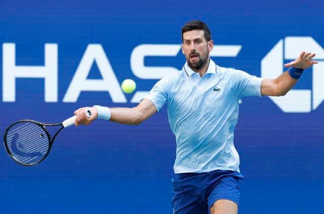 Novak Djokovic of Serbia returns the ball to Carlos Alcaraz of Spain in the 1st set in a Men s semifinal match at the 2025 US Open Tennis Championship at the USTA Billie Jean King National Tennis Center in New York City on Friday, September 5, 2025.  NYP20250905906 JOHNxANGELILLO