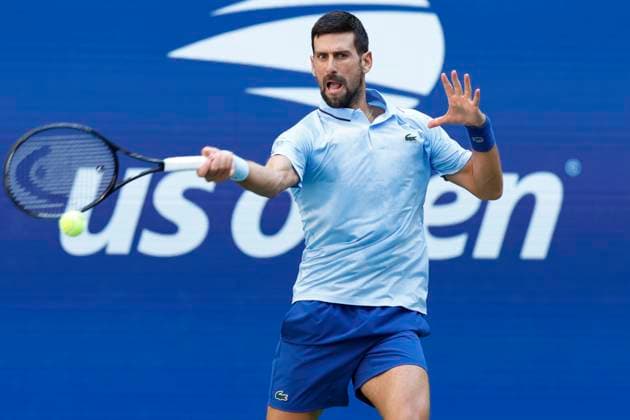 Novak Djokovic of Serbia returns the ball to Carlos Alcaraz of Spain in the 1st set in a Men s semifinal match at the 2025 US Open Tennis Championship at the USTA Billie Jean King National Tennis Center in New York City on Friday, September 5, 2025.  NYP20250905908 JOHNxANGELILLO