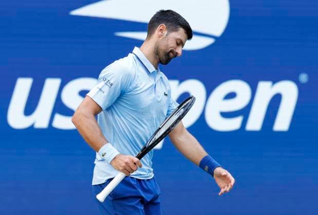 Novak Djokovic of Serbia reacts after losing a point to Carlos Alcaraz of Spain in the 1st set in a Men s semifinal match at the 2025 US Open Tennis Championship at the USTA Billie Jean King National Tennis Center in New York City on Friday, September 5, 2025.  NYP20250905910 JOHNxANGELILLO